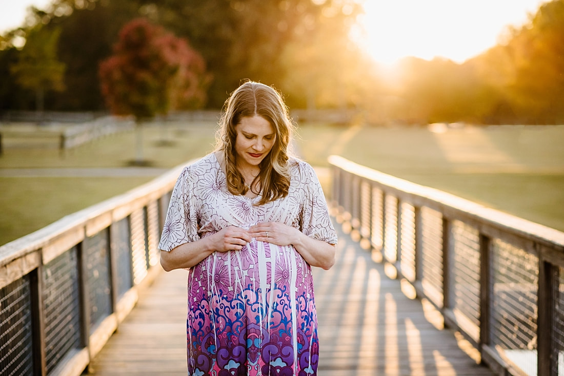 fall maternity photos at Hinton Park in Collierville, TN during golden hour