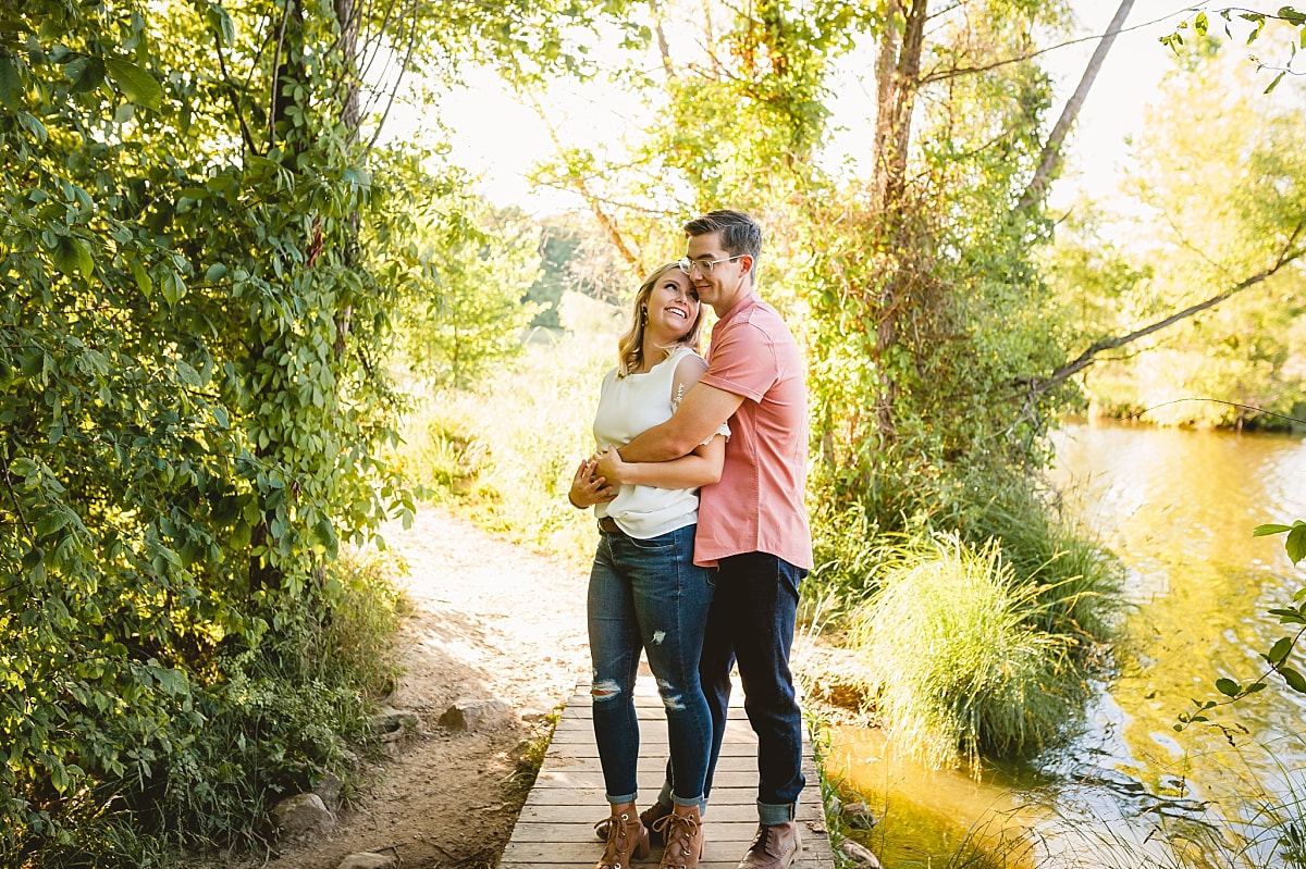 couple posing for engagement photos at shelby farms park in memphis, tn