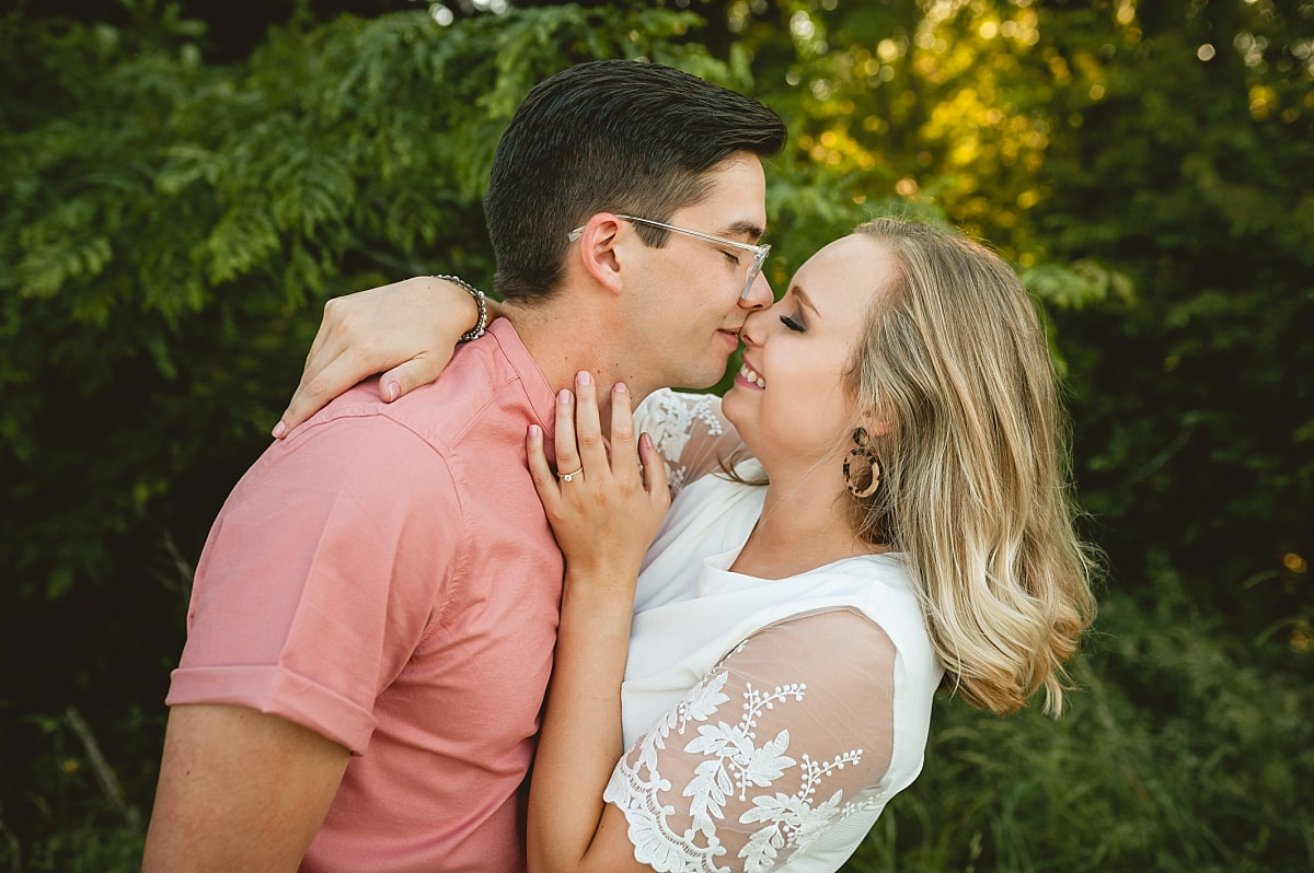 couple posing for engagement photos at shelby farms park in memphis, tn