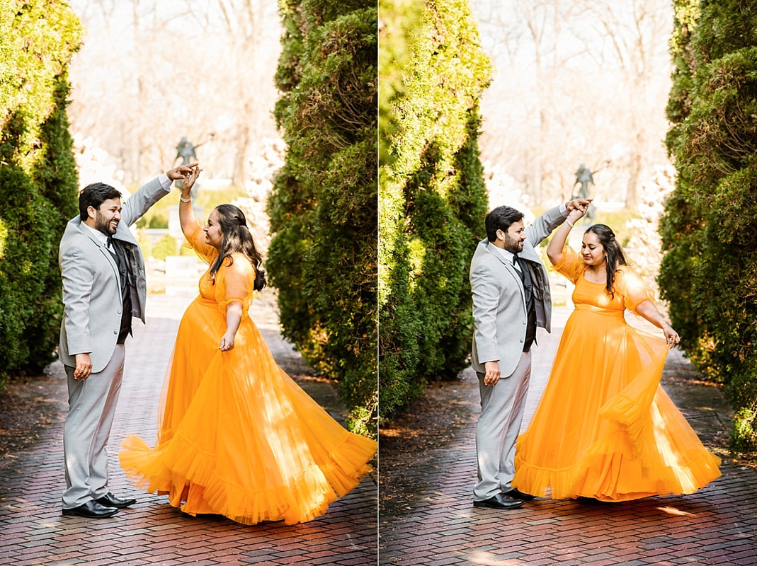 mother and father dancing during maternity photo session at memphis botanic garden