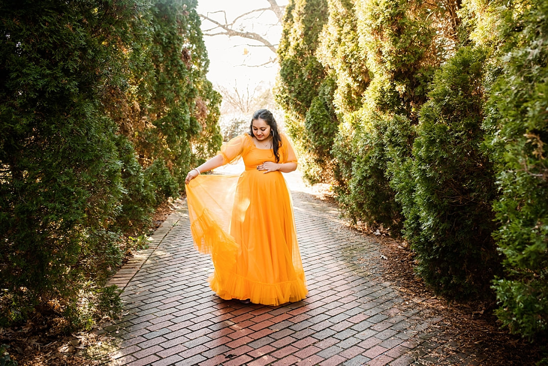 maternity portrait of mother wearing beautiful Indian dress at memphis botanic garden