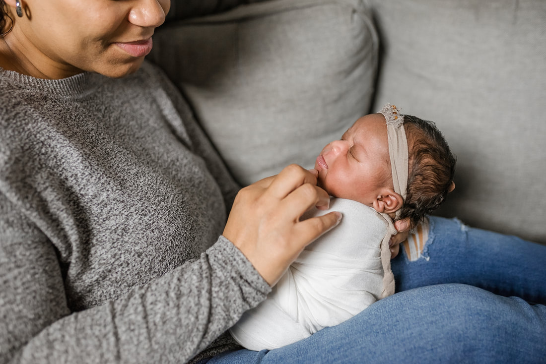 portrait of new parents with newborn baby in Memphis, TN