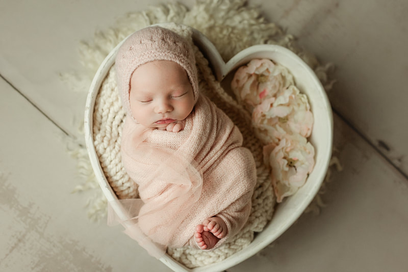 Newborn Baby in Heart shaped bowl, Newborn Photos in Memphis, TN.
Sarah Morris Photography