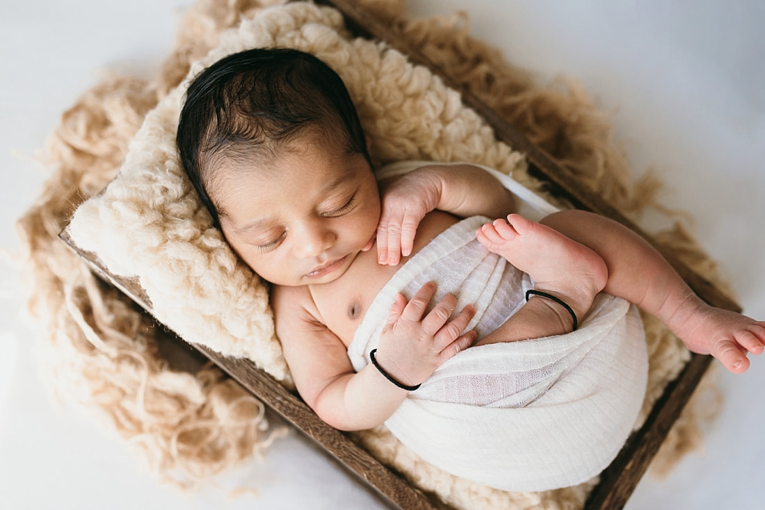 baby boy posed for newborn photos in memphis