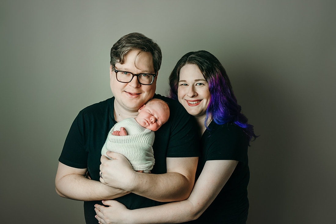 newborn baby with parents for newborn photos in Memphis, TN