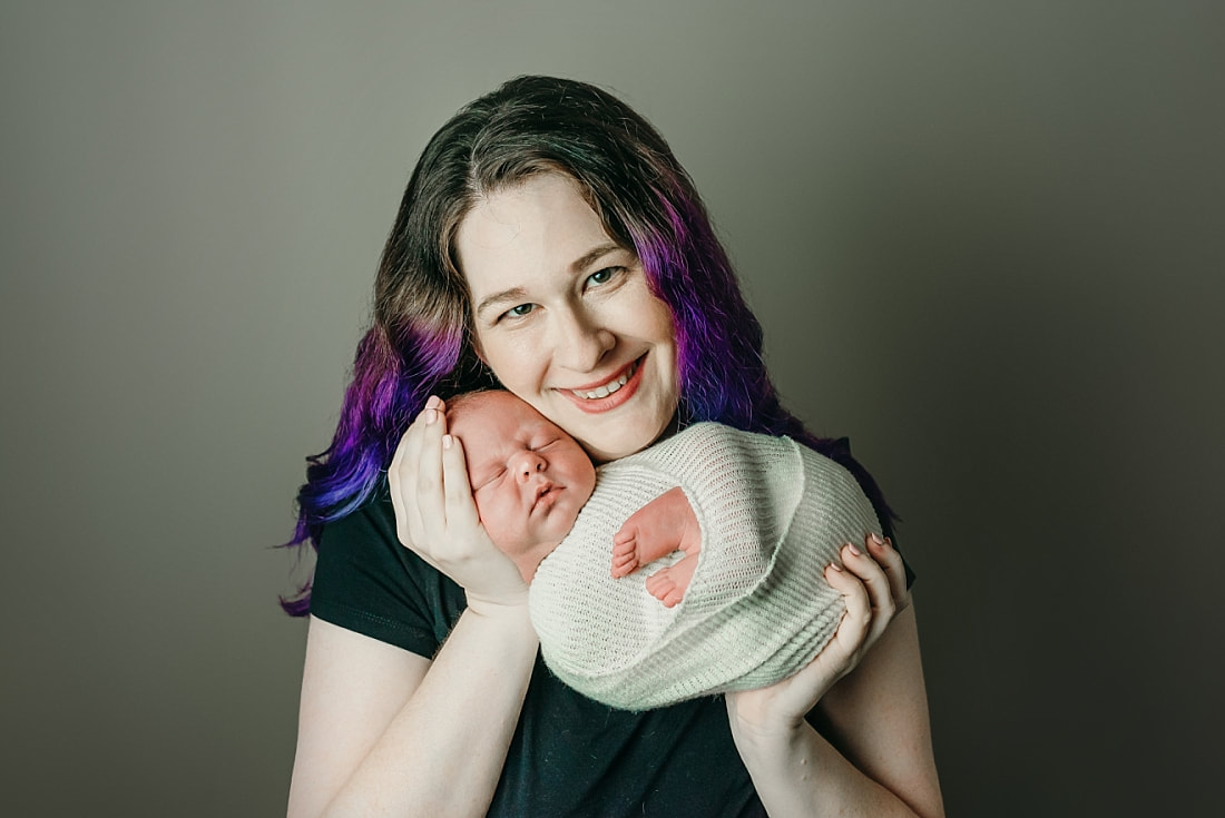 newborn baby with mom for newborn photos in Memphis, TN